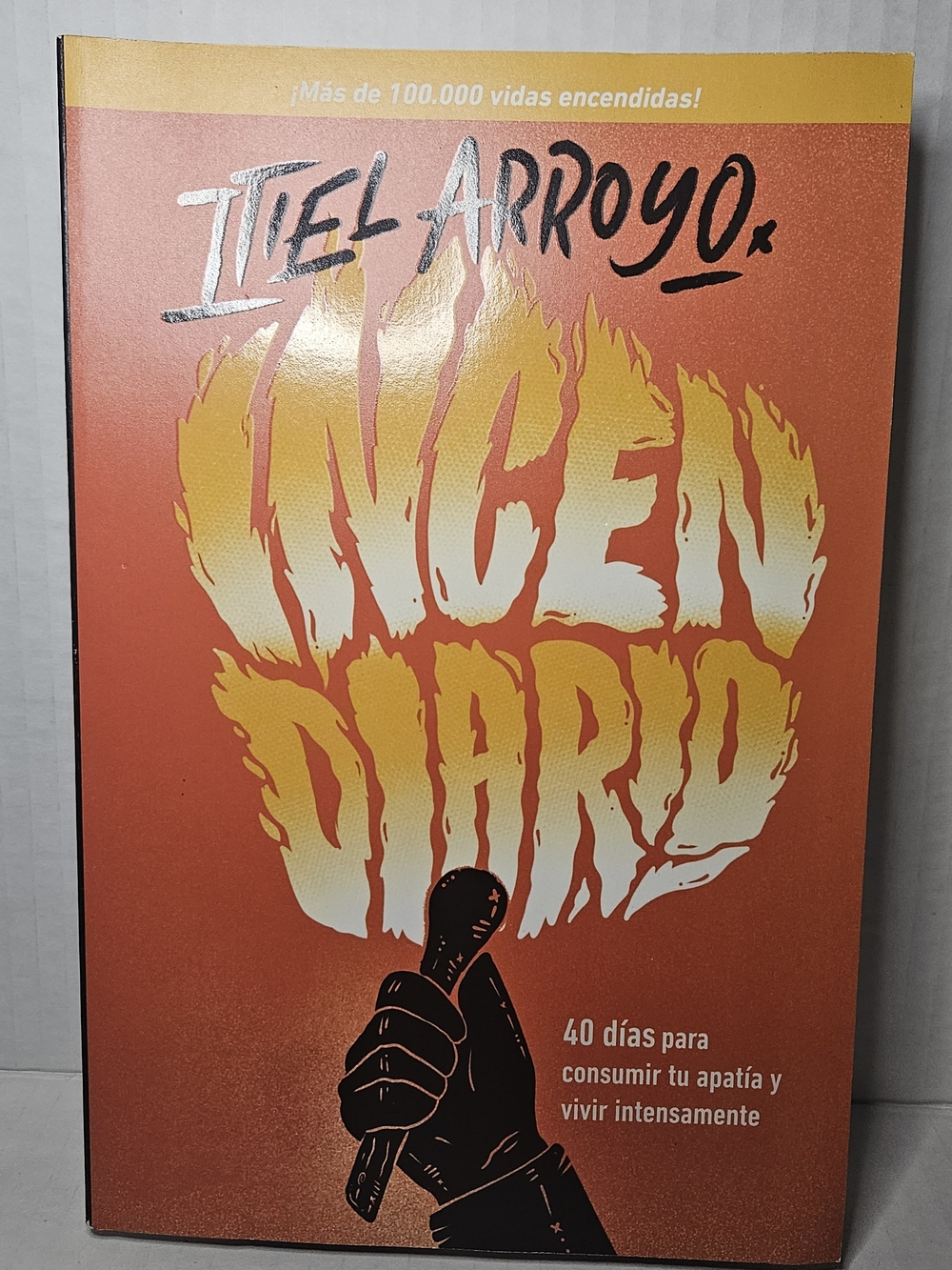 Incendio Diario by Izel Arroyo - Orange & Yellow Book Cover